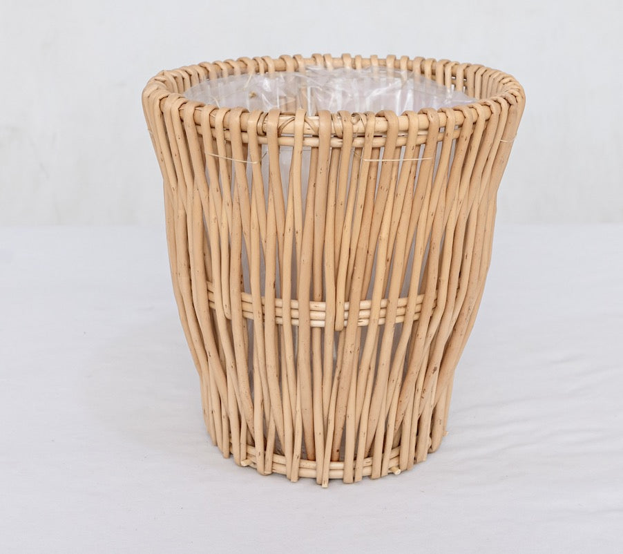 Handwoven willow planter basket in Natural with a plastic liner, 10 in top opening